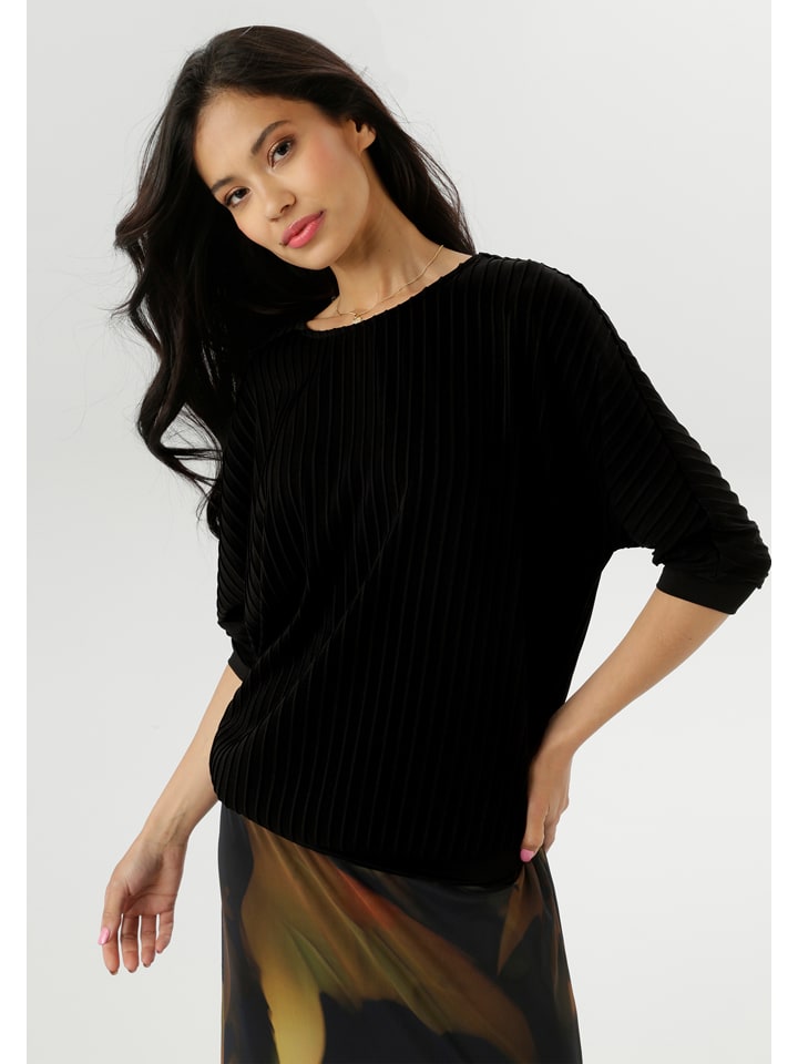 Aniston Футболка с длинными рукавами черного цвета
Aniston Футболка с длинными рукавами черного цвета