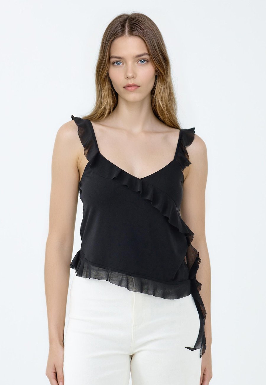 Блуза Jimmy Key CUT STRAPPY V NECK SHORT, Black
Блуза Jimmy Key CUT STRAPPY V NECK SHORT, Black