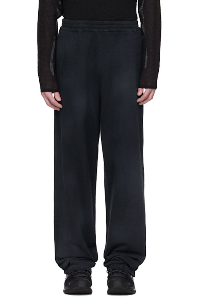 Темно-синие брюки для отдыха с заклепками Omar Afridi
Темно-синие брюки для отдыха с заклепками Omar Afridi