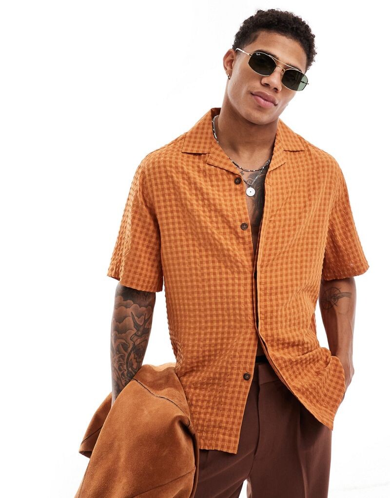 Свободная рубашка из жатого хлопка горчичного цвета с короткими рукавами ASOS DESIGN
Свободная рубашка из жатого хлопка горчичного цвета с короткими рукавами ASOS DESIGN