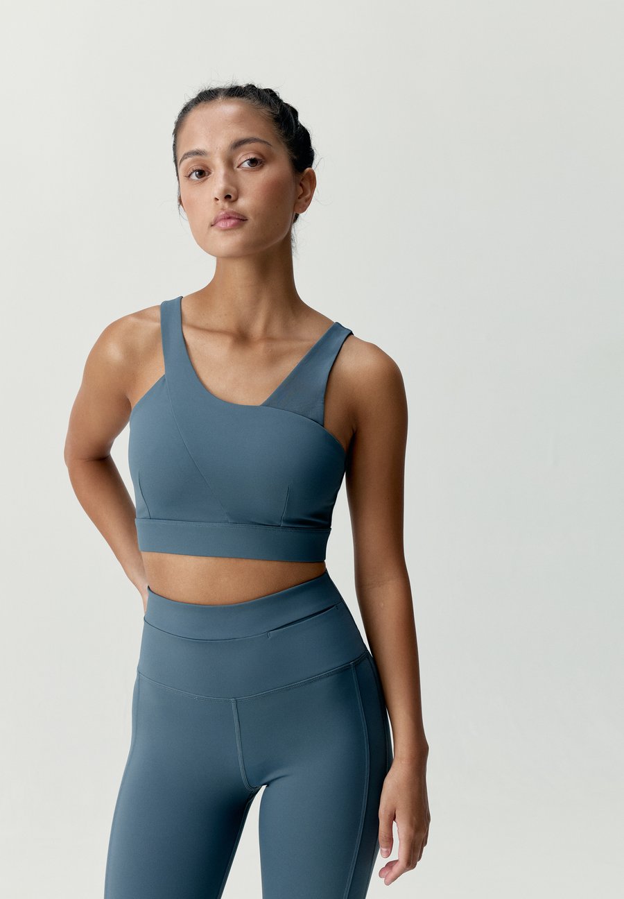 Бюстгальтер Born Living Yoga JIN, Stormy/Blue
Бюстгальтер Born Living Yoga JIN, Stormy/Blue