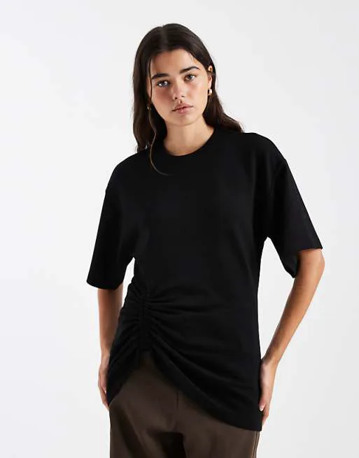 Черный топ с короткими рукавами и рюшами ASOS DESIGN
Черный топ с короткими рукавами и рюшами ASOS DESIGN