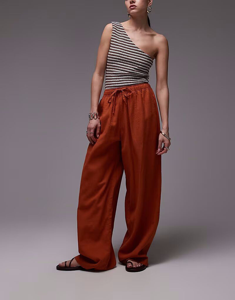 Брюки-баллоны из льна Topshop в выжженном оранжевом цвете
Брюки-баллоны из льна Topshop в выжженном оранжевом цвете