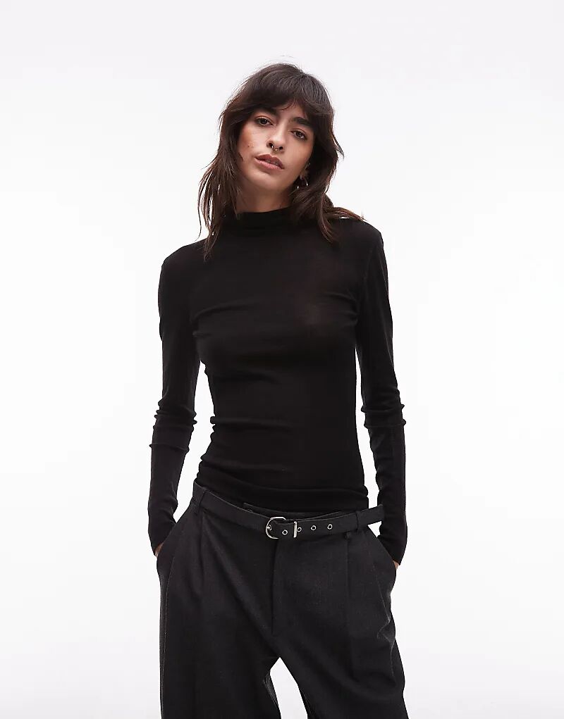 Вязаный топ ARKET из мериносовой шерсти с длинными рукавами и капюшоном черного цвета
Вязаный топ ARKET из мериносовой шерсти с длинными рукавами и капюшоном черного цвета