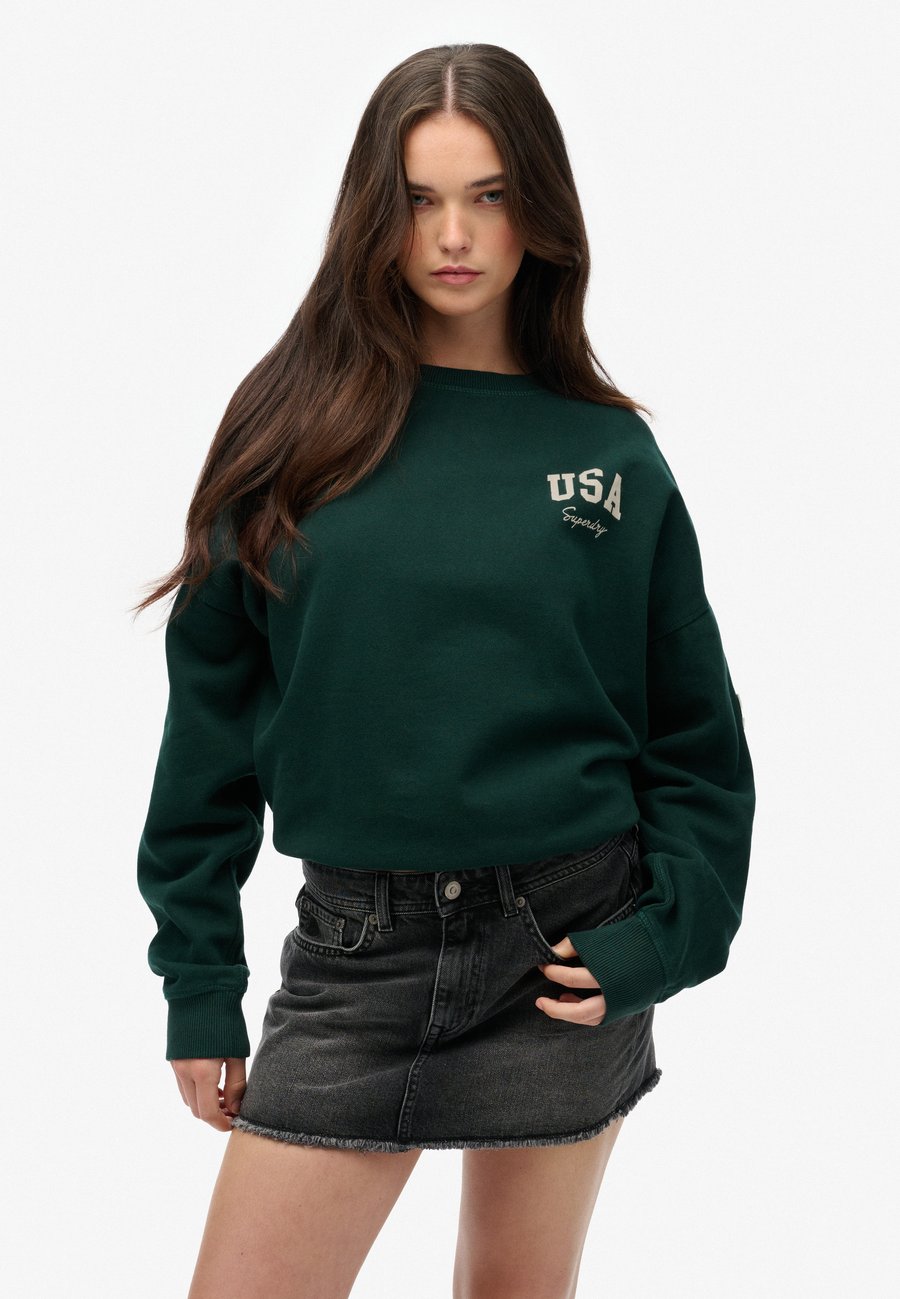 Толстовка Superdry & Co SUPERDRY ATHLETIC ESSENTIALS RELAXED CREW , Dark Pine Green/Green
Толстовка Superdry & Co SUPERDRY ATHLETIC ESSENTIALS RELAXED CREW , Dark Pine Green/Green