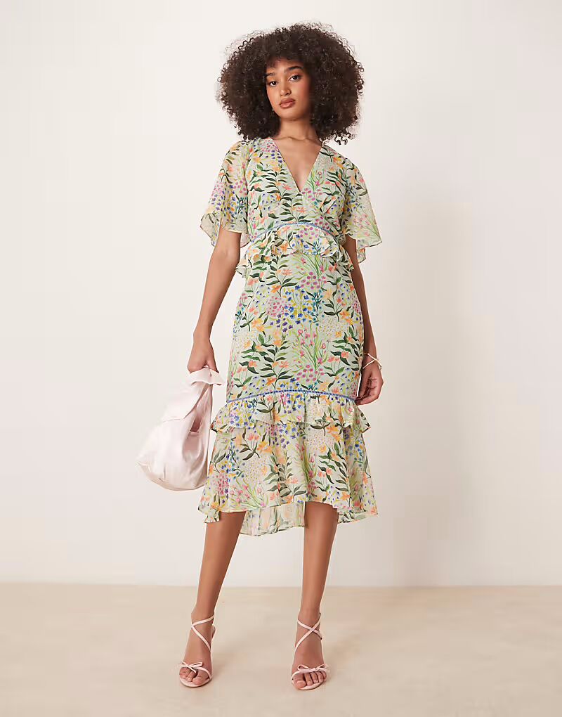 Платье миди Hope & Ivy с баской на талии и зеленым принтом
Платье миди Hope & Ivy с баской на талии и зеленым принтом