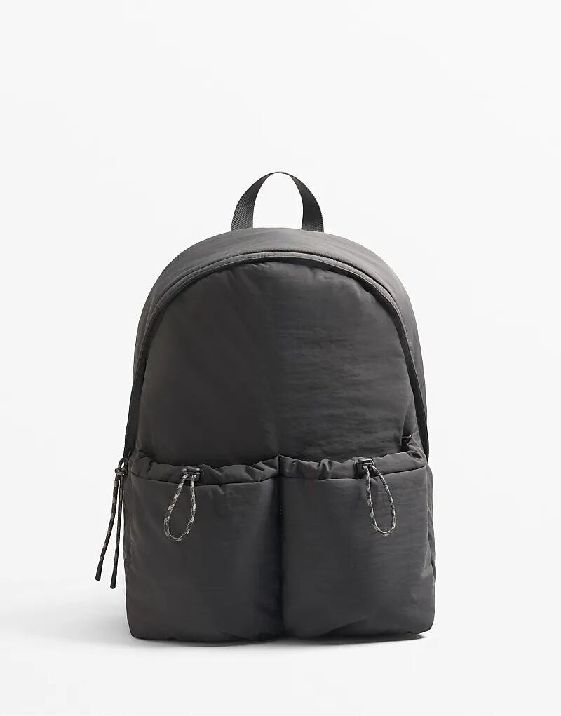Рюкзак OYSHO с карманами антрацитово-серого цвета
Рюкзак OYSHO с карманами антрацитово-серого цвета