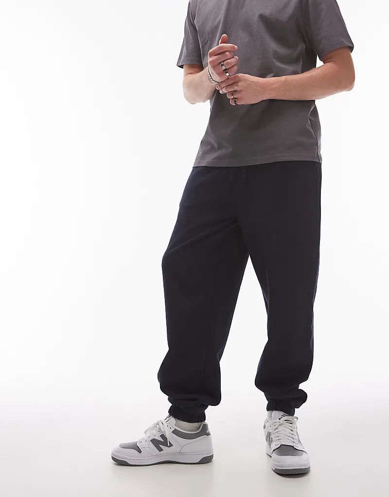 Свободные джоггеры темно-синего цвета Topman
Свободные джоггеры темно-синего цвета Topman