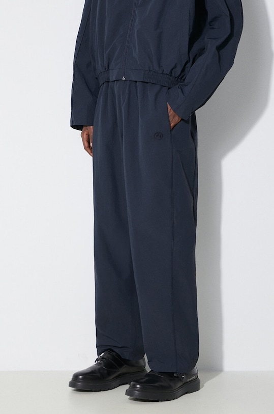 Брюки Nylon Track Pants Ambush, темно-синий
Брюки Nylon Track Pants Ambush, темно-синий