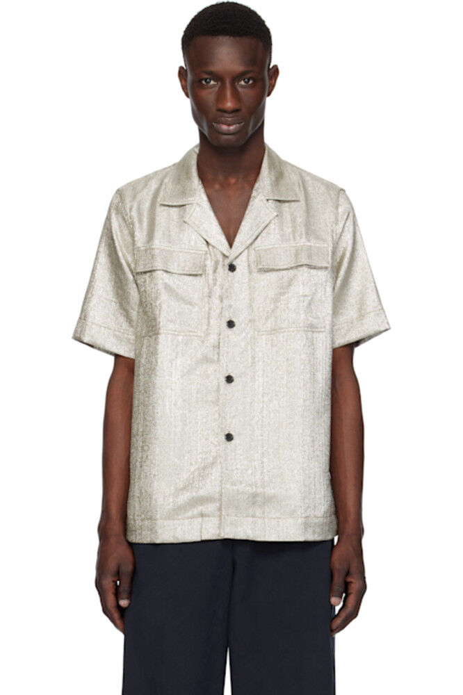 Рубашка из серебристой ткани ламе Dries Van Noten
Рубашка из серебристой ткани ламе Dries Van Noten