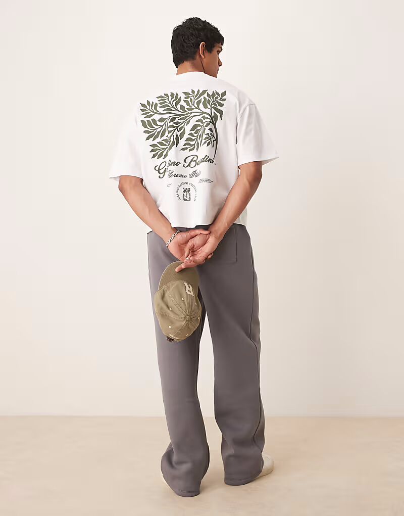 Футболка свободного кроя ASOS DESIGN с принтом листьев белого цвета 
Футболка свободного кроя ASOS DESIGN с принтом листьев белого цвета