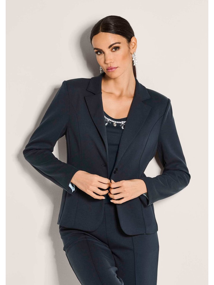 MADELEINE Трикотажный блейзер модного укороченного фасона темно-синего цвета
MADELEINE Трикотажный блейзер модного укороченного фасона темно-синего цвета