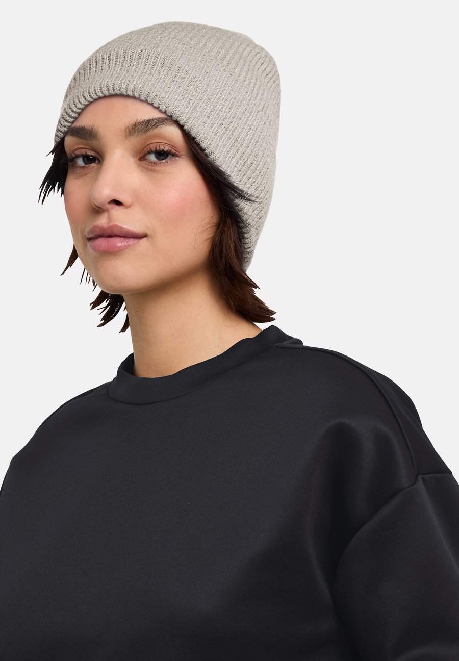 Шапка Jack Wolfskin FUZZY, Pale Sand/Beige
Шапка Jack Wolfskin FUZZY, Pale Sand/Beige