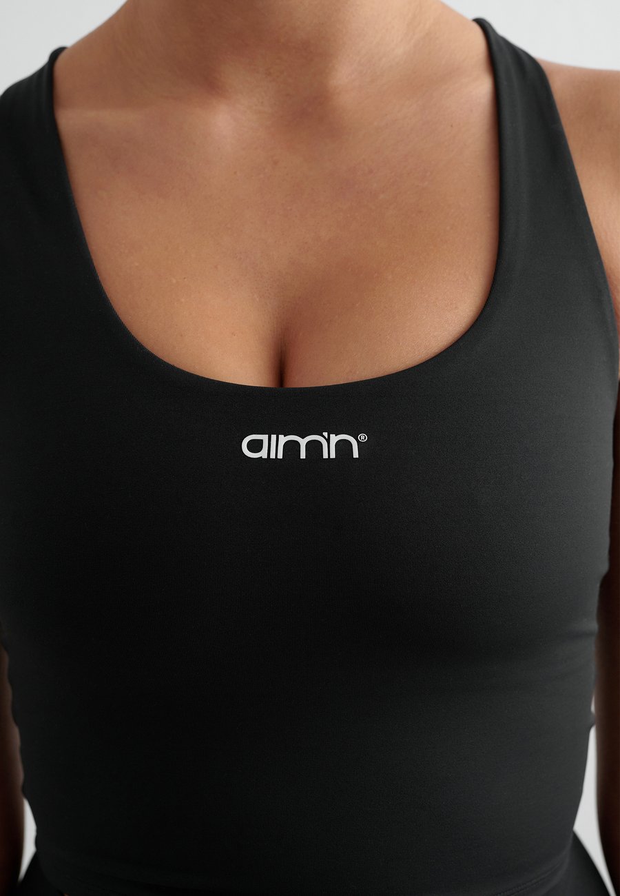 Бюстгальтер aim’n CORE ESSENTIAL, Black
Бюстгальтер aim’n CORE ESSENTIAL, Black