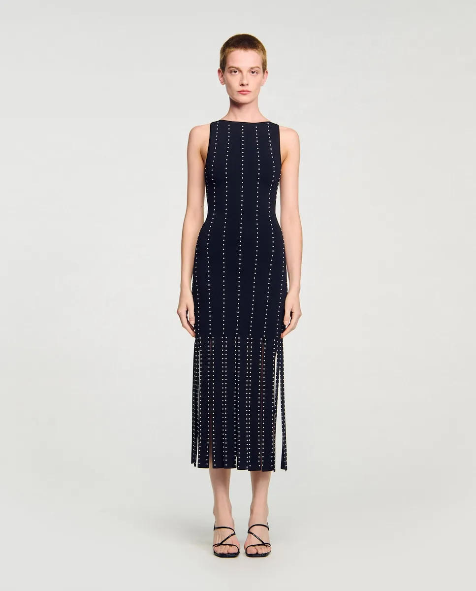 Длинное трикотажное платье с бахромой Sandro, черный
Длинное трикотажное платье с бахромой Sandro, черный