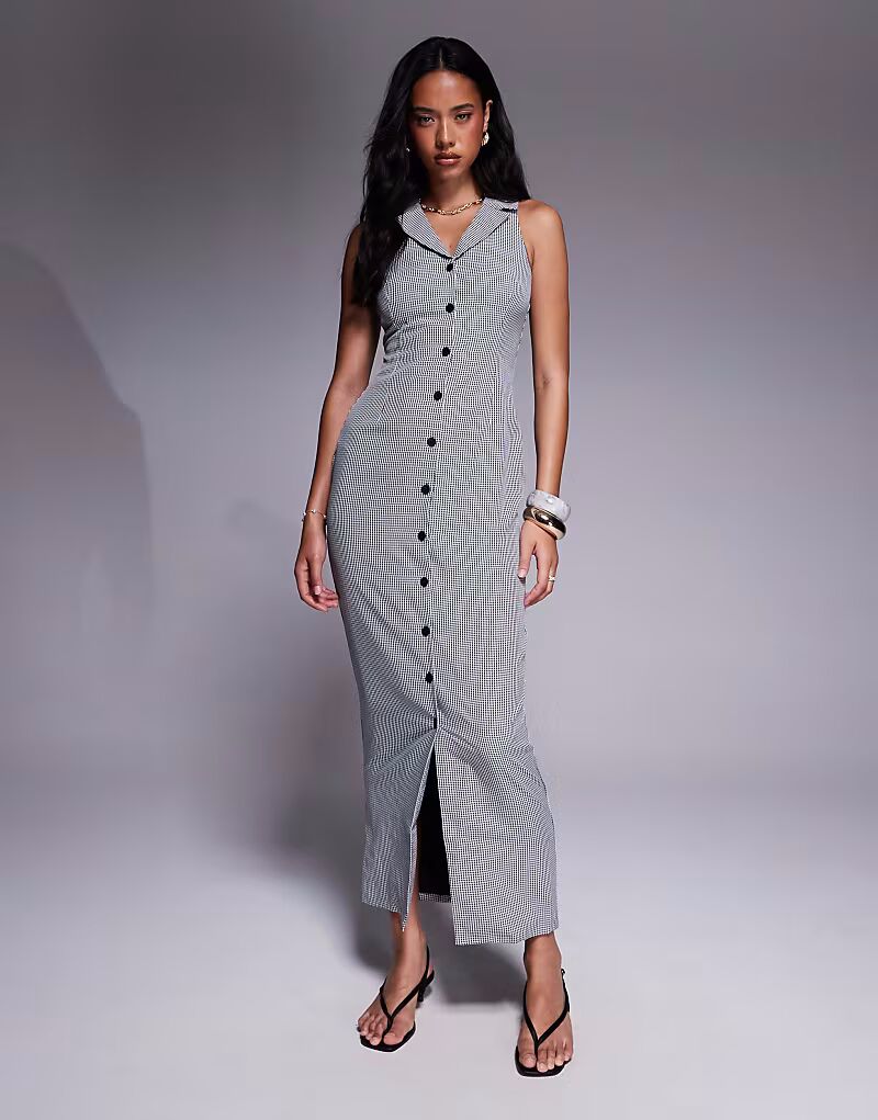 Эксклюзивное платье макси Kaiia с воротником-халтер и застежкой на пуговицы в черную клетку в клетку 
Эксклюзивное платье макси Kaiia с воротником-халтер и застежкой на пуговицы в черную клетку в клетку