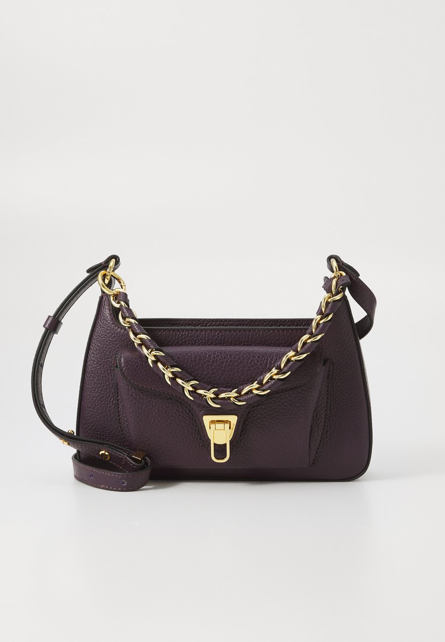 Сумка Coccinelle BEAT GENERATIO, Prune/Lilac
Сумка Coccinelle BEAT GENERATIO, Prune/Lilac