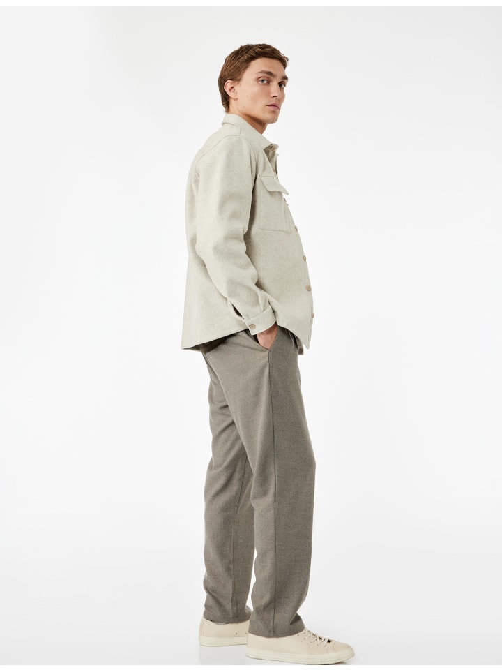 Брюки бежевого цвета KOTON
Брюки бежевого цвета KOTON