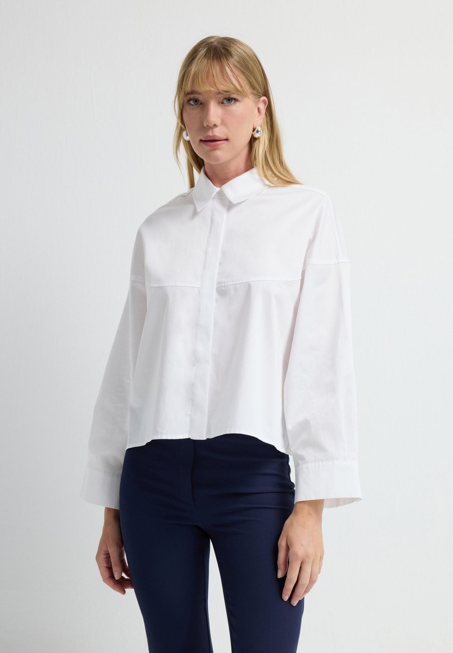 Блуза adL Button-down blouse, White
Блуза adL Button-down blouse, White