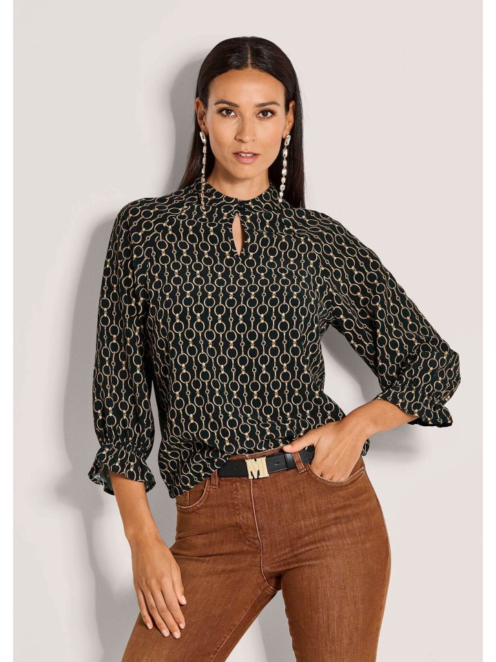 MADELEINE Элегантная вискозная блузка с графическим принтом в черно-коричнево-многоцветной гамме
MADELEINE Элегантная вискозная блузка с графическим принтом в черно-коричнево-многоцветной гамме