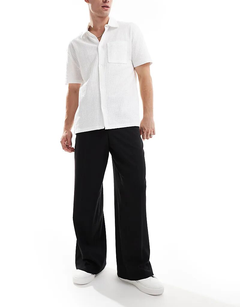 Элегантные свободные брюки черного цвета ASOS DESIGN
Элегантные свободные брюки черного цвета ASOS DESIGN