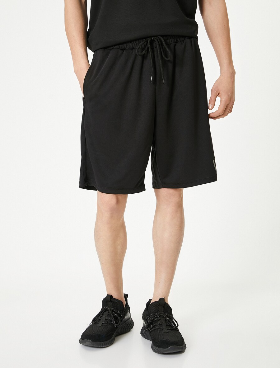 Обычные брюки Koton, черный 
Обычные брюки Koton, черный