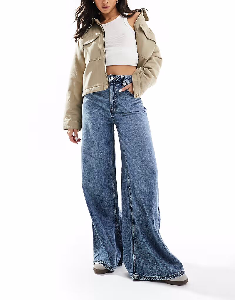 Джинсы широкого кроя, средне-синего цвета Asos Design
Джинсы широкого кроя, средне-синего цвета Asos Design