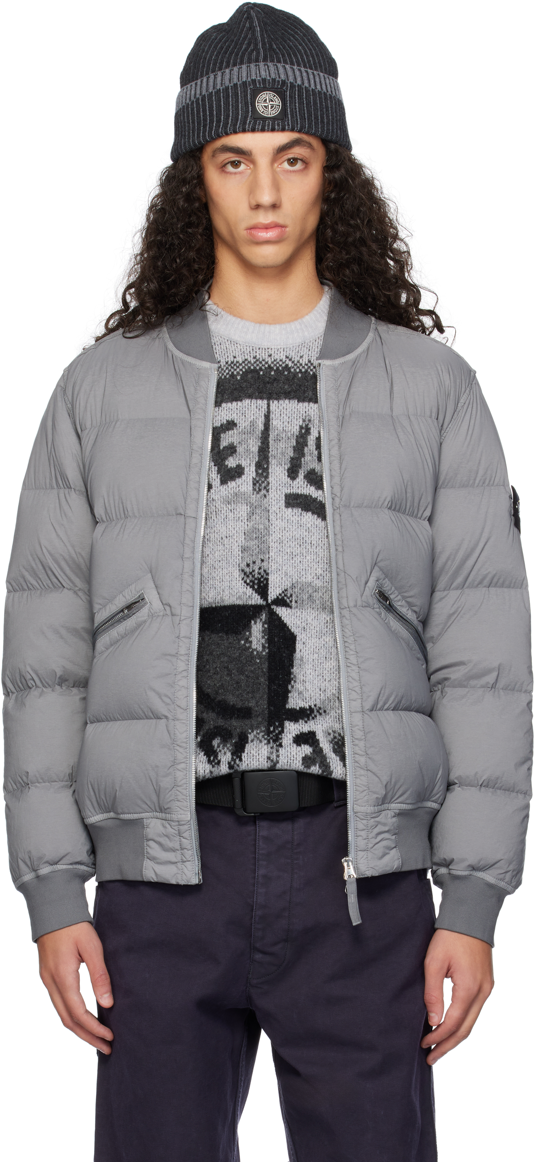 Серый стеганый пуховик Stone Island
Серый стеганый пуховик Stone Island