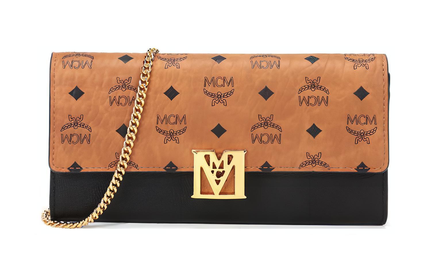 MCM Кожаный женский кошелек через плечо на цепочке черный
MCM Кожаный женский кошелек через плечо на цепочке черный