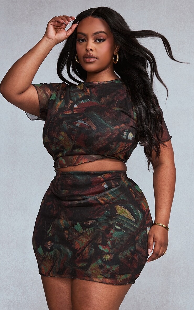 PrettyLittleThing Сетчатый топ Plus с разноцветным принтом на подоле салата
PrettyLittleThing Сетчатый топ Plus с разноцветным принтом на подоле салата