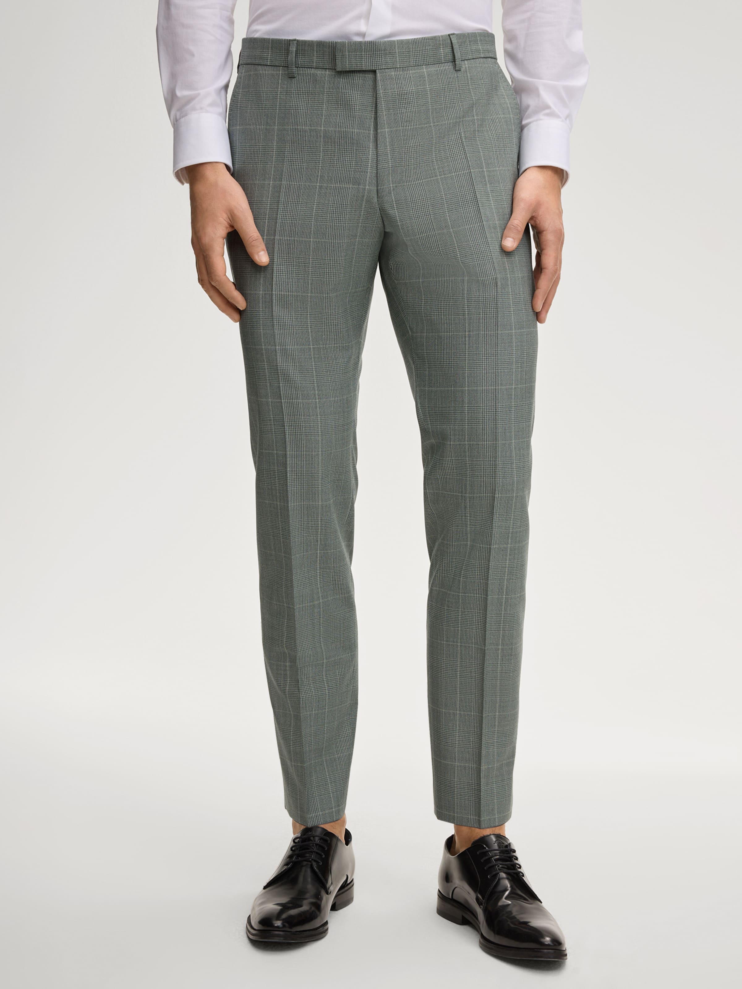 JOOP! Узкие брюки 'Blayr' со складками в пастельно-зеленом и темно-зеленом цветах
JOOP! Узкие брюки 'Blayr' со складками в пастельно-зеленом и темно-зеленом цветах