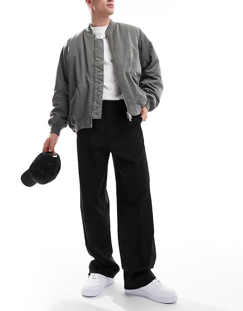 Черные элегантные широкие брюки с застежкой на подоле ASOS DESIGN
Черные элегантные широкие брюки с застежкой на подоле ASOS DESIGN