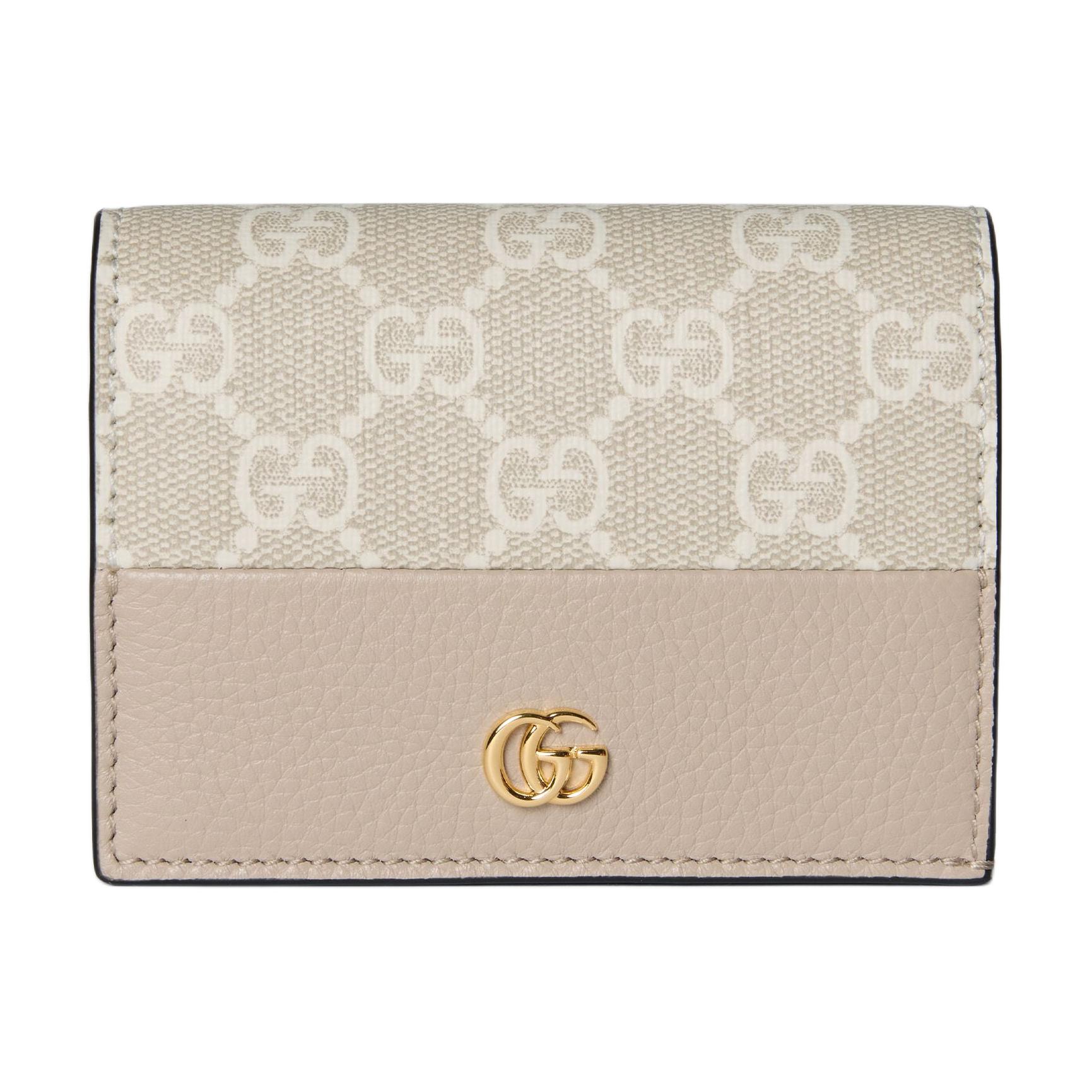 GUCCI Миниатюрный женский кошелек из кожи и панелированного холста
GUCCI Миниатюрный женский кошелек из кожи и панелированного холста