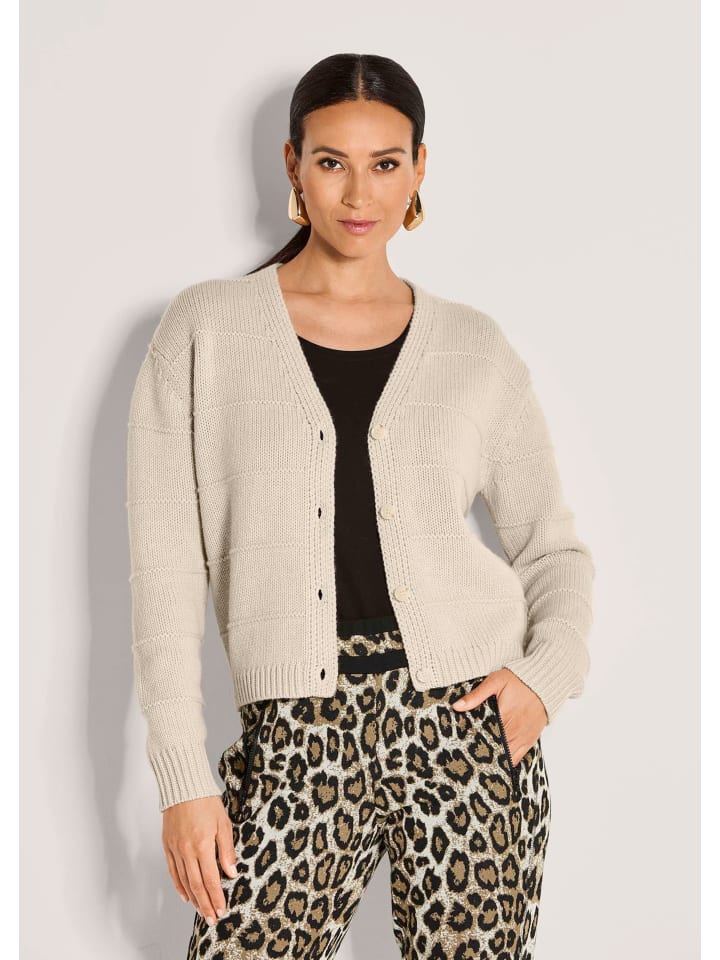 MADELEINE Элегантный шерстяной кардиган в полоску жемчужно-белого цвета
MADELEINE Элегантный шерстяной кардиган в полоску жемчужно-белого цвета