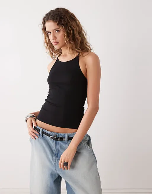 Черный облегающий жилет со спиной-борцовкой Weekday
Черный облегающий жилет со спиной-борцовкой Weekday