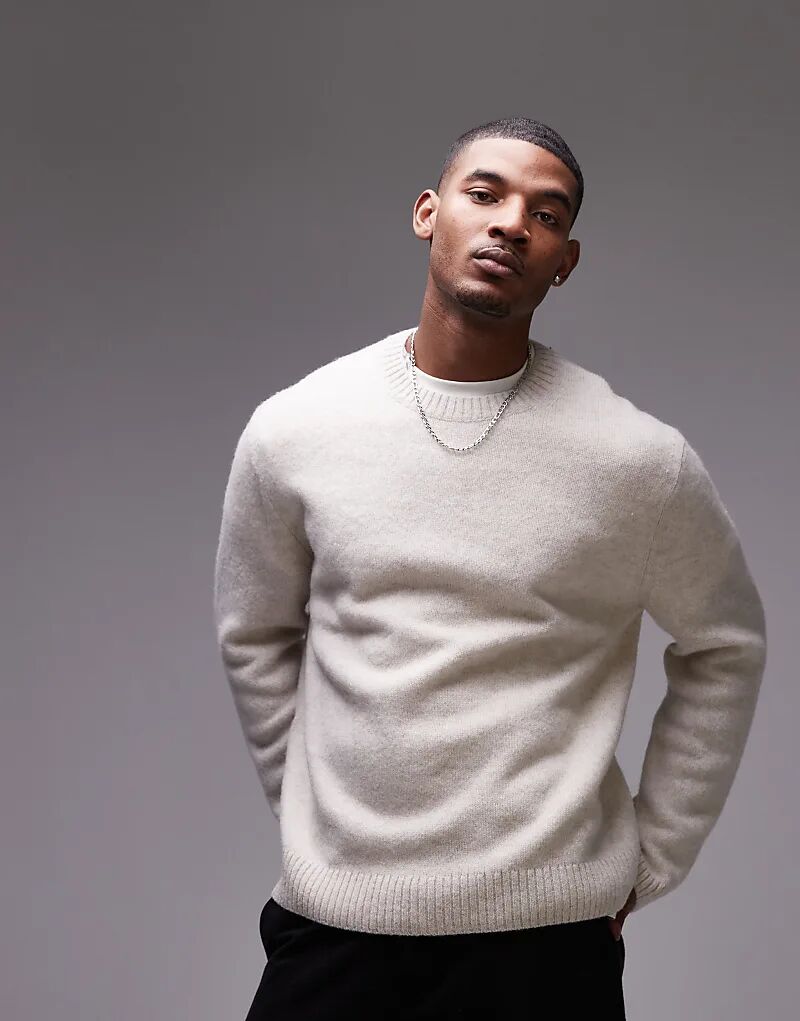 Шерстяной вязаный свитер ARKET с круглым вырезом в цвете «кремовый»
Шерстяной вязаный свитер ARKET с круглым вырезом в цвете «кремовый»