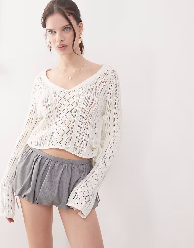 Топ Noisy May с открытой вязкой и сборками по бокам в кремово-белом цвете
Топ Noisy May с открытой вязкой и сборками по бокам в кремово-белом цвете