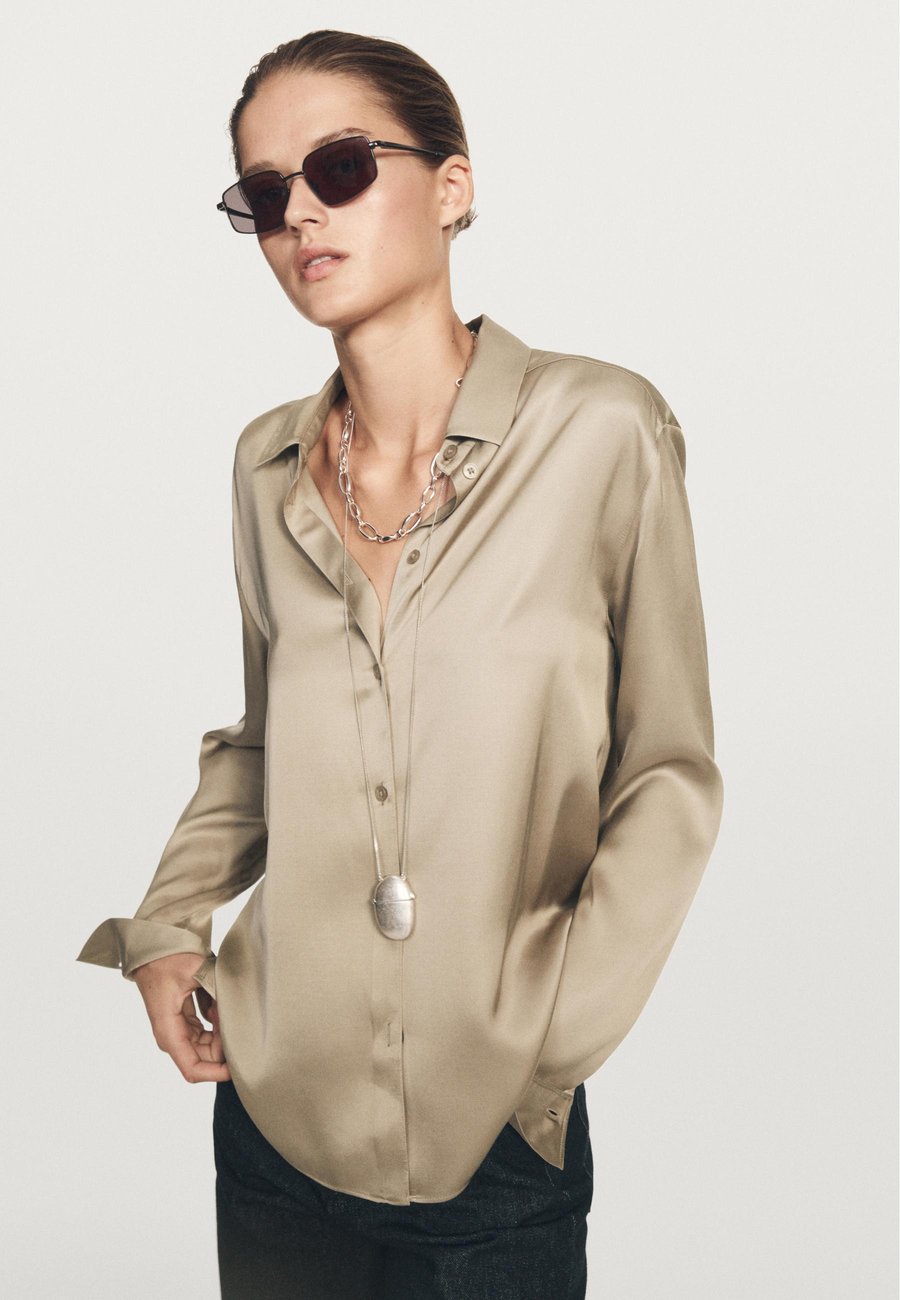 Блуза Massimo Dutti FLOWING SATIN LONG SLEEVE, Beige
Блуза Massimo Dutti FLOWING SATIN LONG SLEEVE, Beige