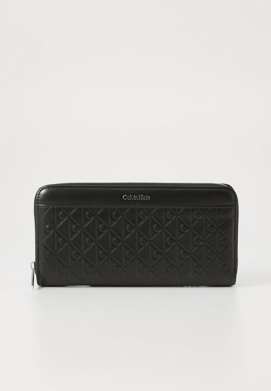 Кошелек Calvin Klein EMBLEM LONG WALLET, Black
Кошелек Calvin Klein EMBLEM LONG WALLET, Black