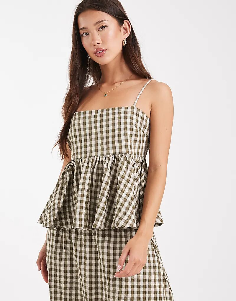 Топ ASOS DESIGN с завязками на плечах и баской в клетку в клетку
Топ ASOS DESIGN с завязками на плечах и баской в клетку в клетку