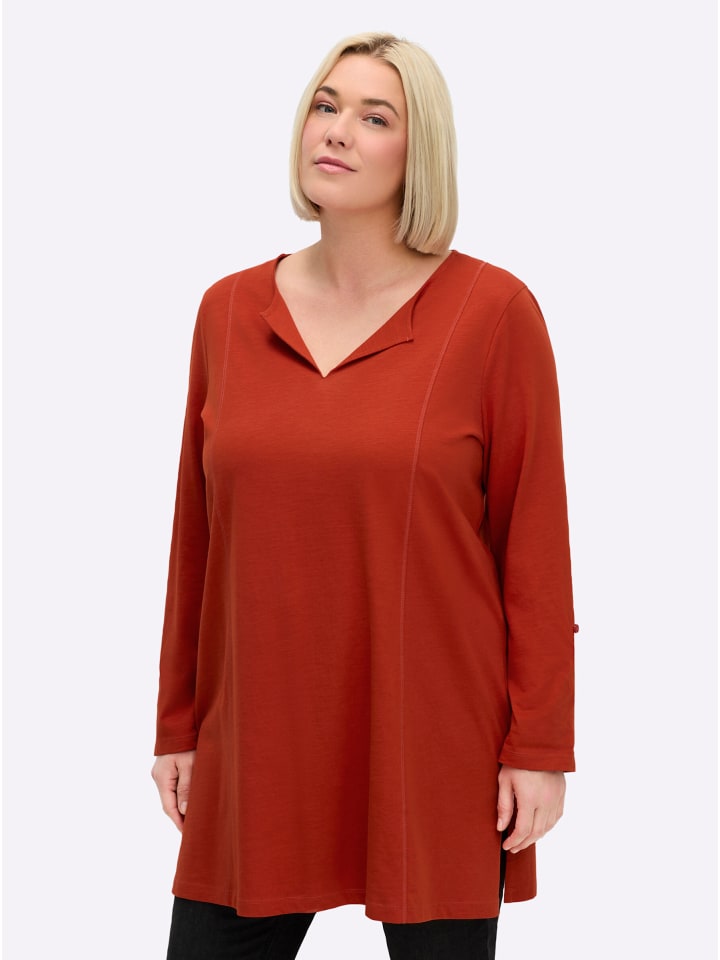 Длинная рубашка ржаво-красного цвета sheego
Длинная рубашка ржаво-красного цвета sheego