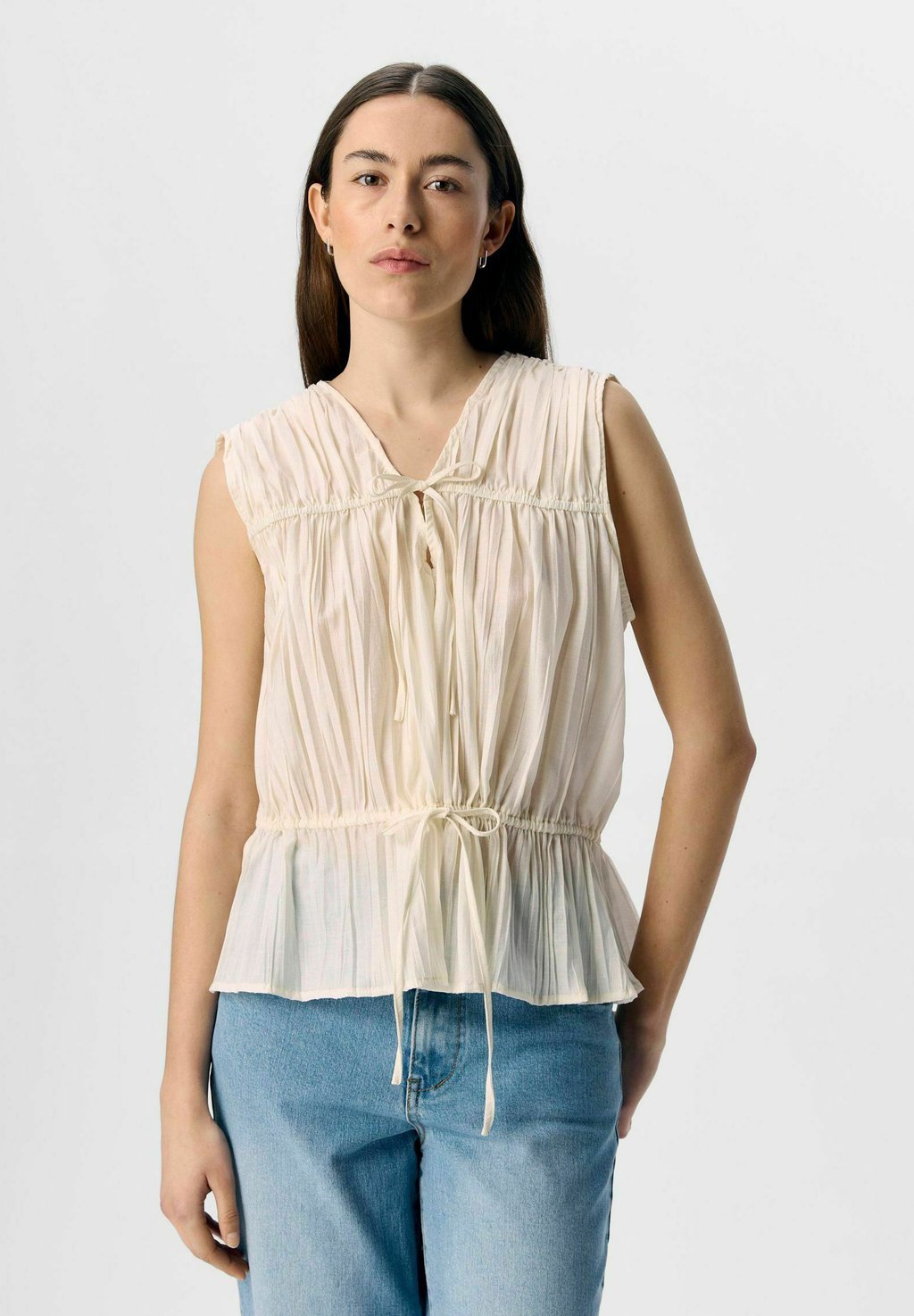 Топ ÄRMELLOSES - Blouse Object, песочный
Топ ÄRMELLOSES - Blouse Object, песочный