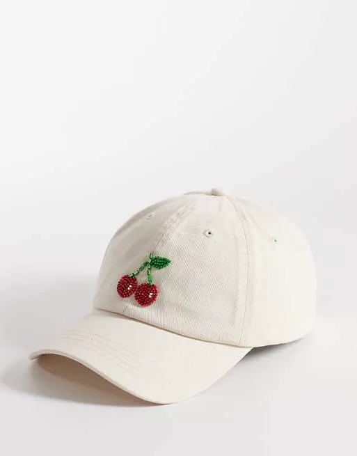 Бежевая шапочка из бисера Accessorize
Бежевая шапочка из бисера Accessorize