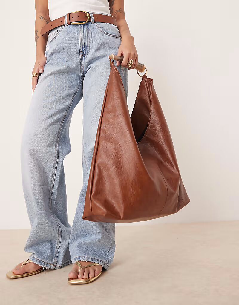 Сумка-тоут ASOS DESIGN с ручкой из смолы, объемная, бежевого цвета
Сумка-тоут ASOS DESIGN с ручкой из смолы, объемная, бежевого цвета