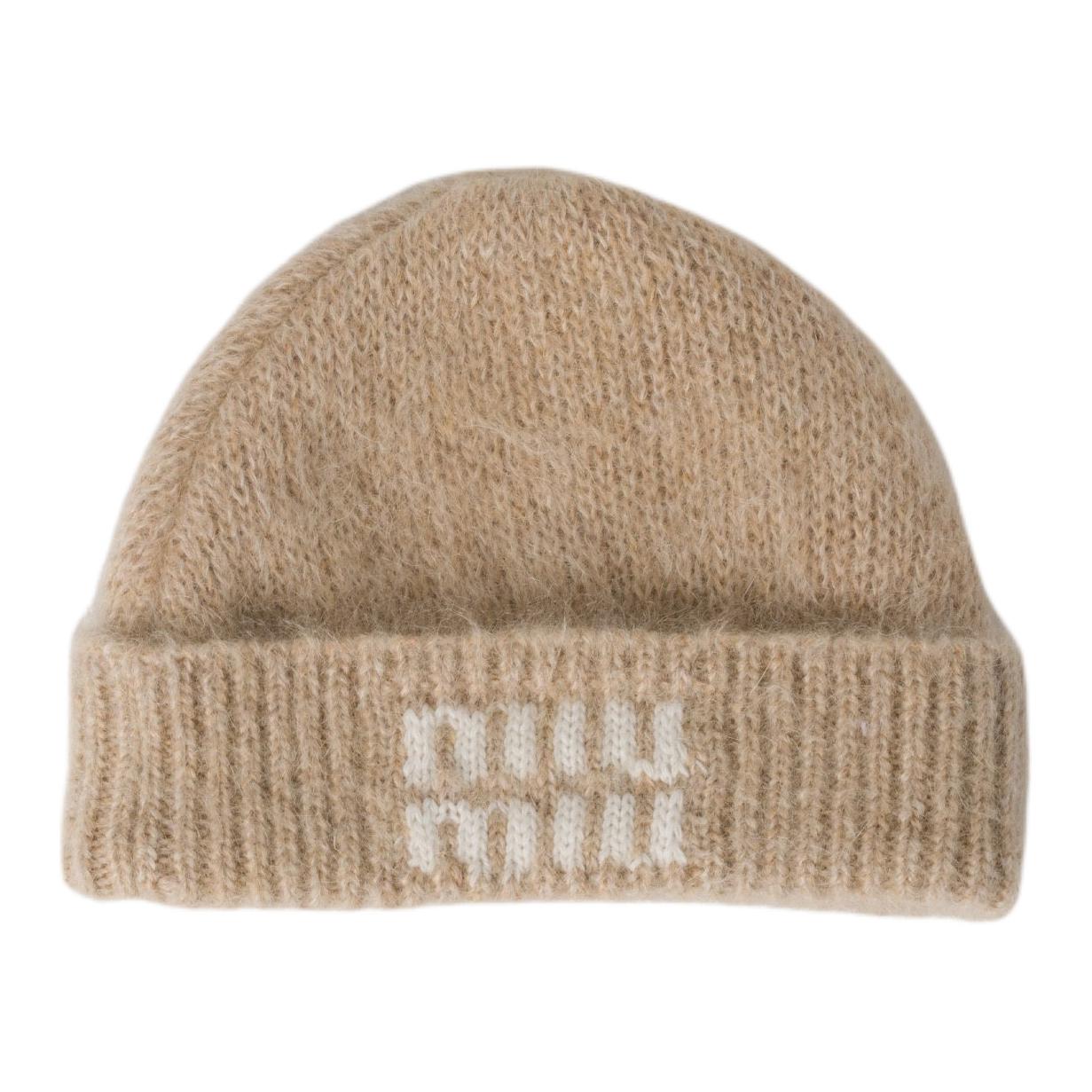 Шерстяная мохеровая тканевая шапка унисекс коричневый MIU MIU
Шерстяная мохеровая тканевая шапка унисекс коричневый MIU MIU