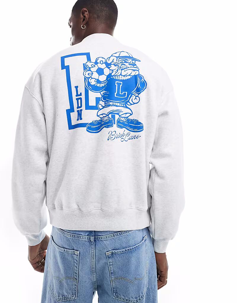 Хлопковая брендовая толстовка Cotton On с боковым кроем и принтом London в сером цвете
Хлопковая брендовая толстовка Cotton On с боковым кроем и принтом London в сером цвете