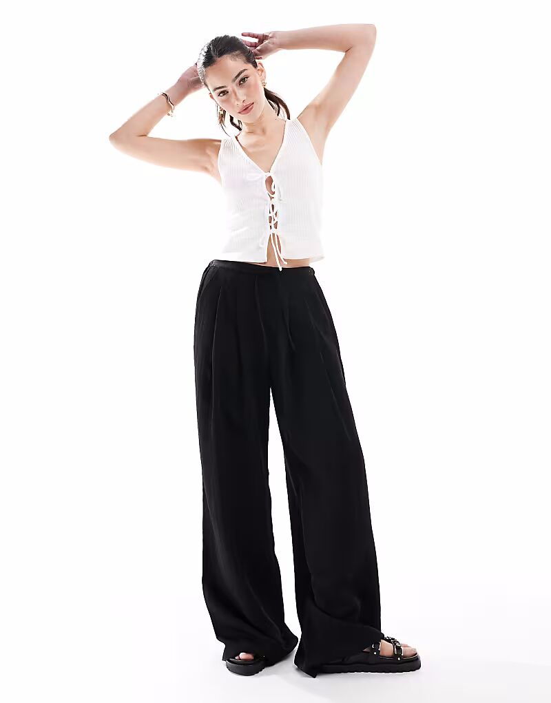 Белая майка New Look из джерси с завязкой спереди
Белая майка New Look из джерси с завязкой спереди