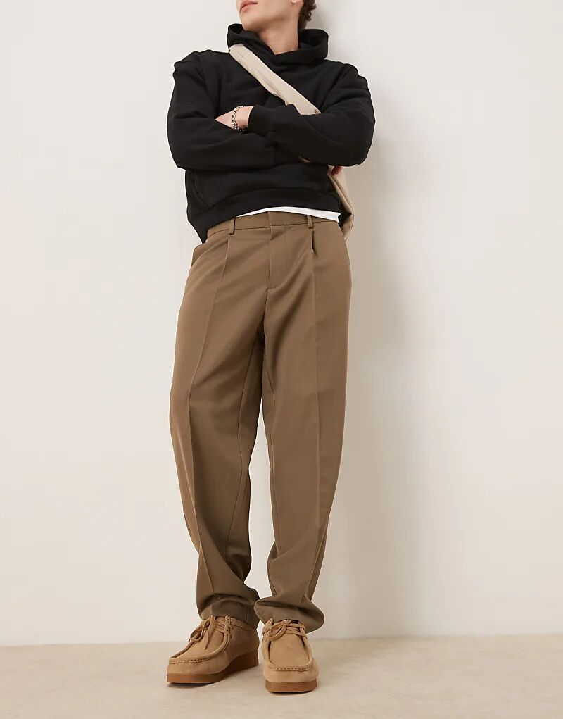 Элегантные зауженные брюки свободного кроя со складкой спереди цвета хаки ASOS DESIGN
Элегантные зауженные брюки свободного кроя со складкой спереди цвета хаки ASOS DESIGN