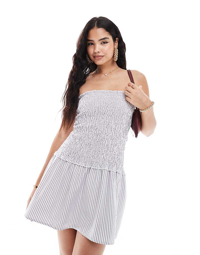 ASOS DESIGN – Мини-платье со сборками, вырезом-бандо, заниженной талией и полосатым узором
ASOS DESIGN – Мини-платье со сборками, вырезом-бандо, заниженной талией и полосатым узором