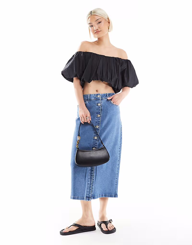 Юбка-миди из денима Vero Moda с пуговицами спереди светло-голубого цвета
Юбка-миди из денима Vero Moda с пуговицами спереди светло-голубого цвета